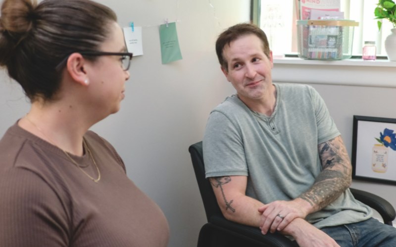 Therapist with his client in addiction treatment