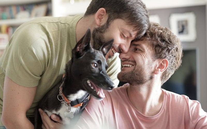 two young men and their dig enjoying a sober lifestyle